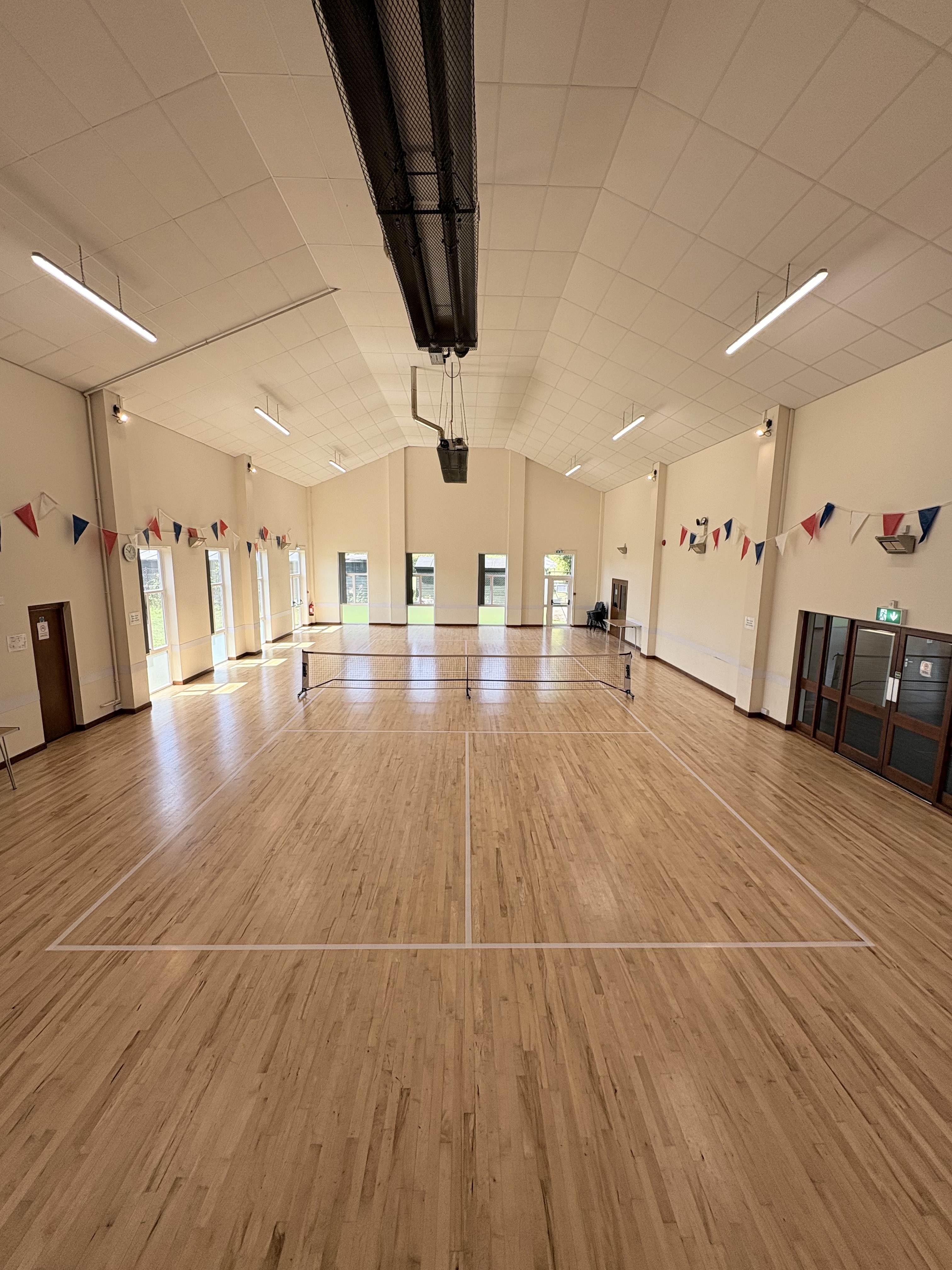 Indoor pickleball court line taping — Suffolk Pickleball Co.